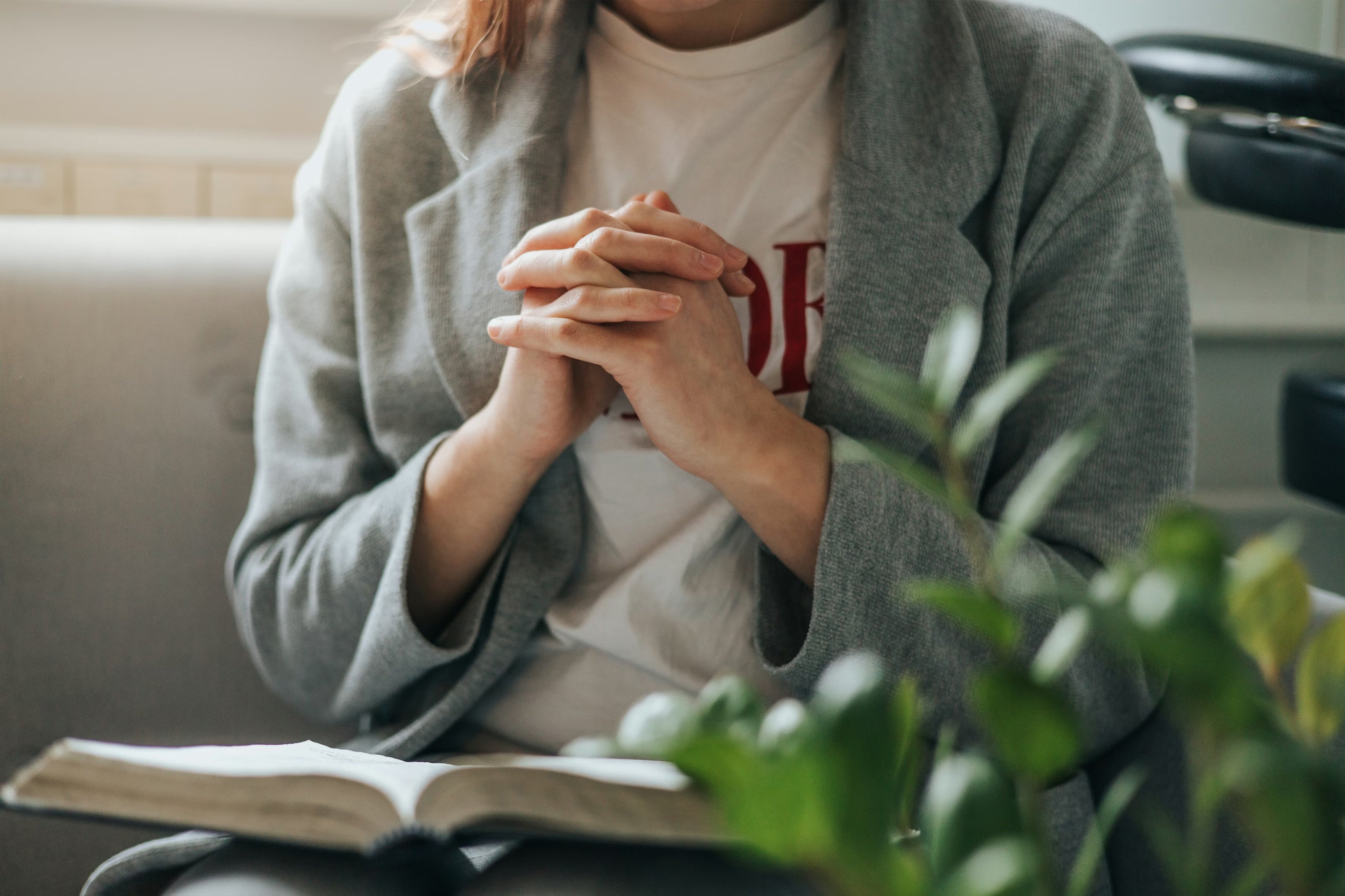 prayer-hands-folded-bible.jpg